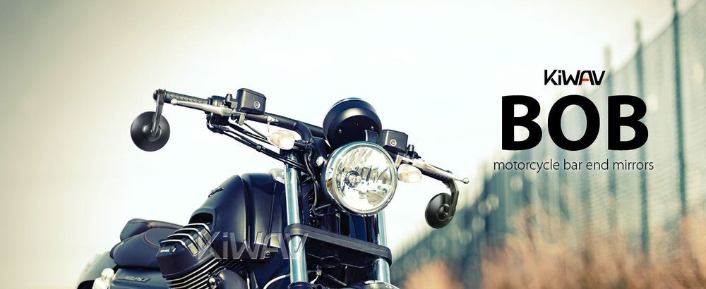 KiWAV Bob heavy weight bar-end mirrors in black on both ends of a classic naked motorcycle handlebar, large round anti-glare glass