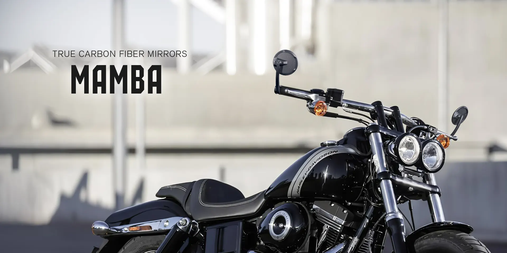 True carbon fiber bar end motorcycle bar end mirrors on a Harley Davidson fat bob - Mamba round