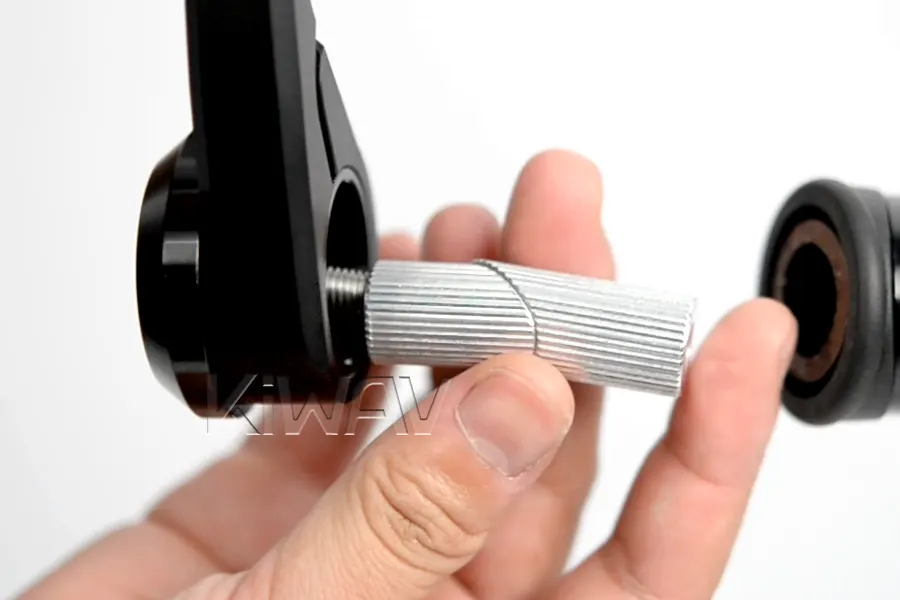 Hand-tighten expansion sleeves slightly so the components stay together
