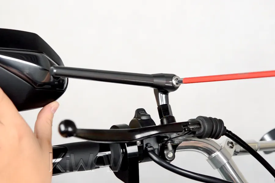 Fine-tune any adjustable joints on the mirror stem and plate.