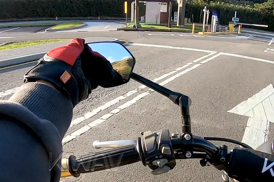 Adjust mirror in riding position.