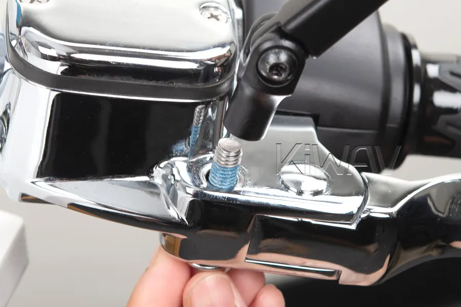 Position the mirror stem over the mounting hole from the opposite side.