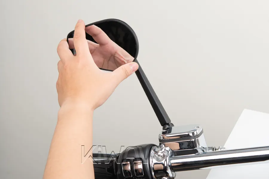 Fine-tune any adjustable joints on the mirror stem or plate in riding position.