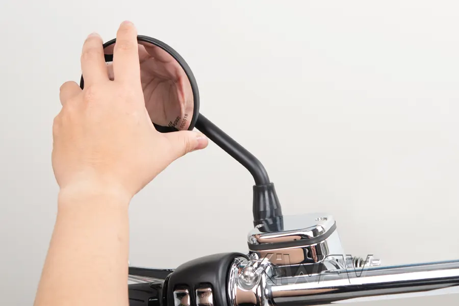 Fine-tune any adjustable joints on the mirror stem or plate in riding position.