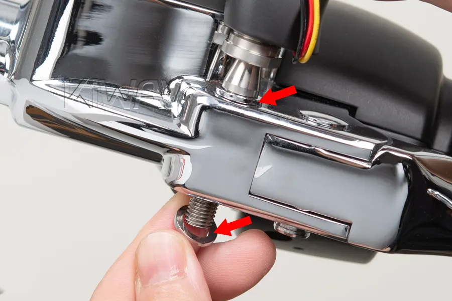 Slide the washers and spacers onto the protruding stud.