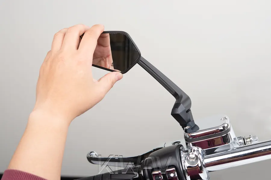 Fine-tune any adjustable joints on the mirror stem or plate in riding position.